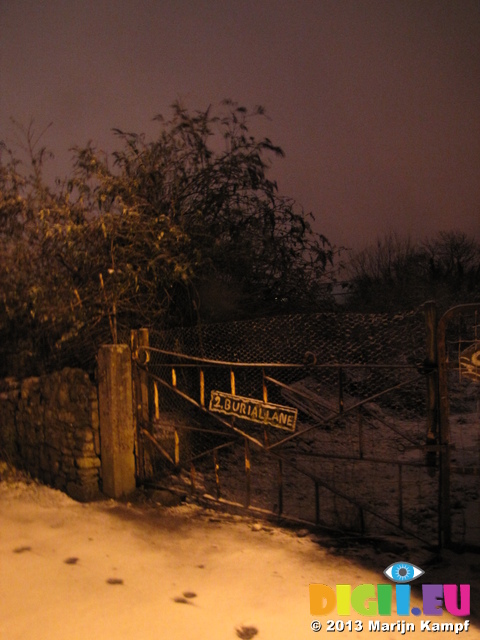 SX25892 Snow covered fence with sign 2 Burial Lane Llantwit Major